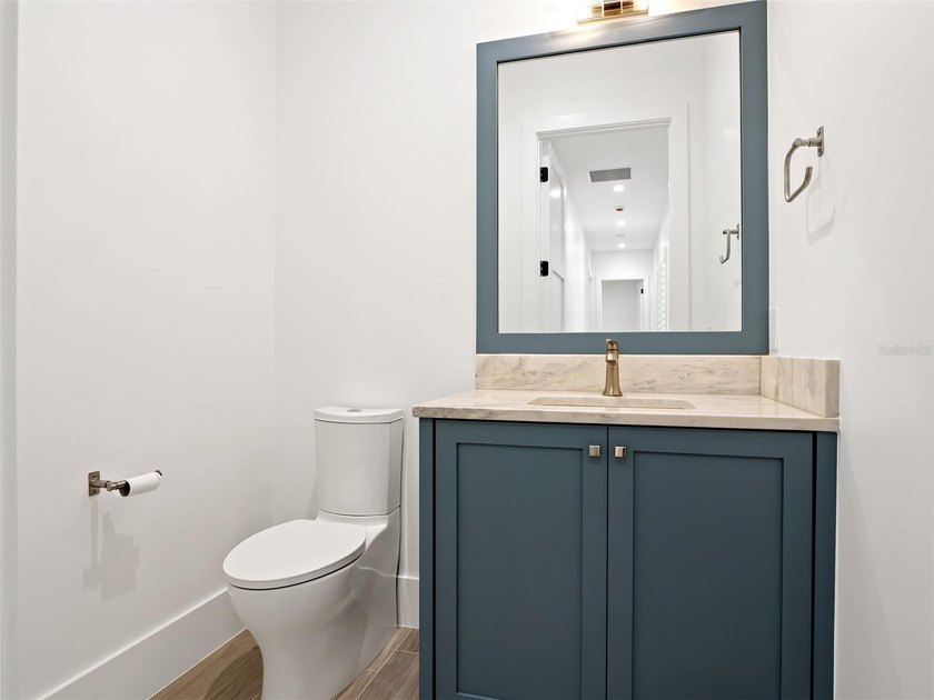 Set within the gates of renowned Isleworth, this beautifully - photo 32