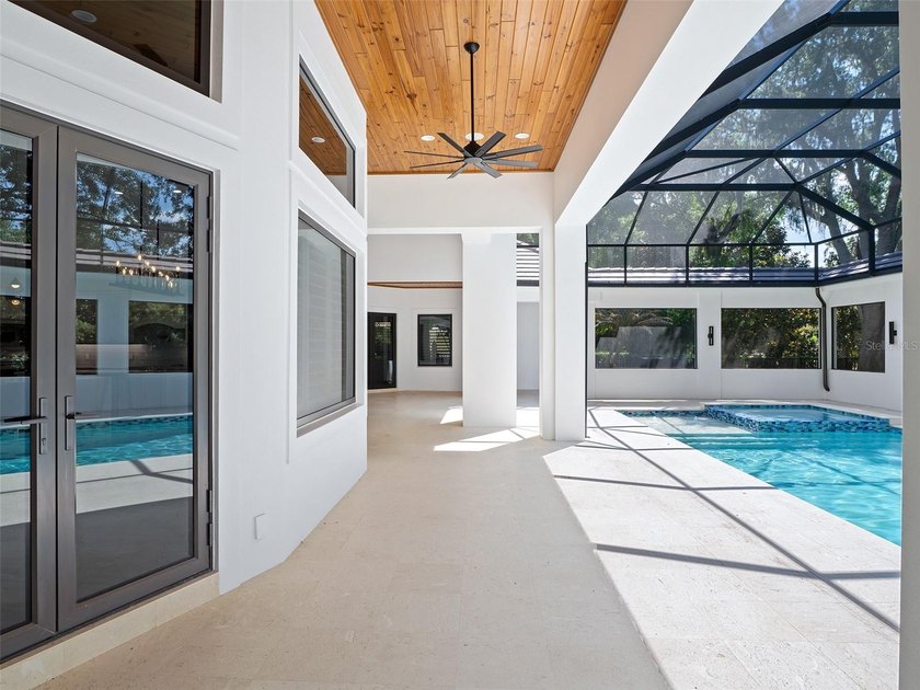 Set within the gates of renowned Isleworth, this beautifully - photo 42