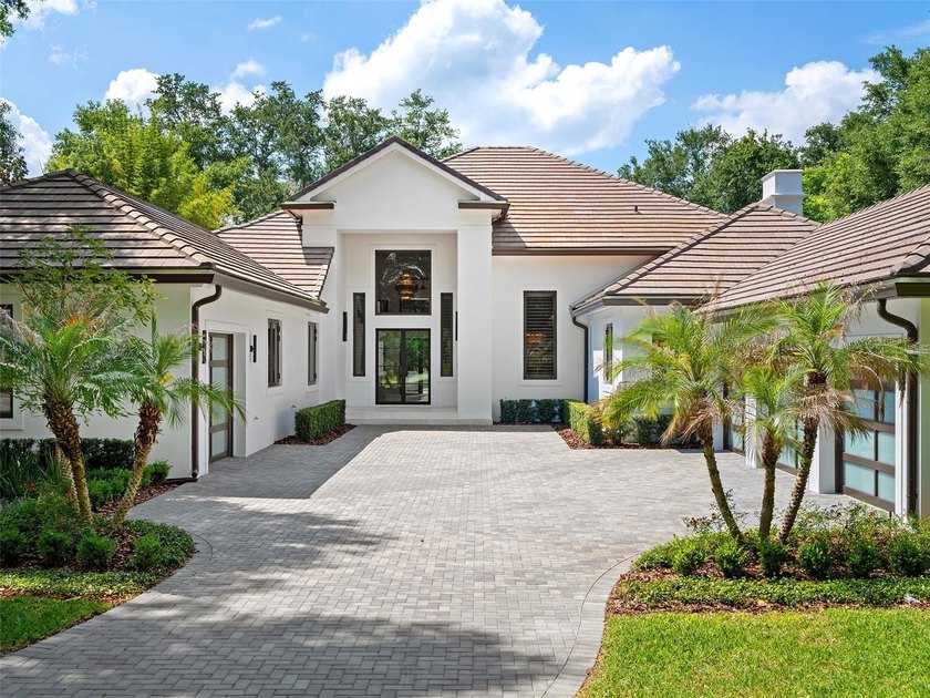 Set within the gates of renowned Isleworth, this beautifully - photo 44