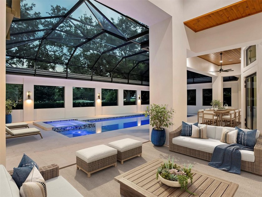 Set within the gates of renowned Isleworth, this beautifully - photo 49