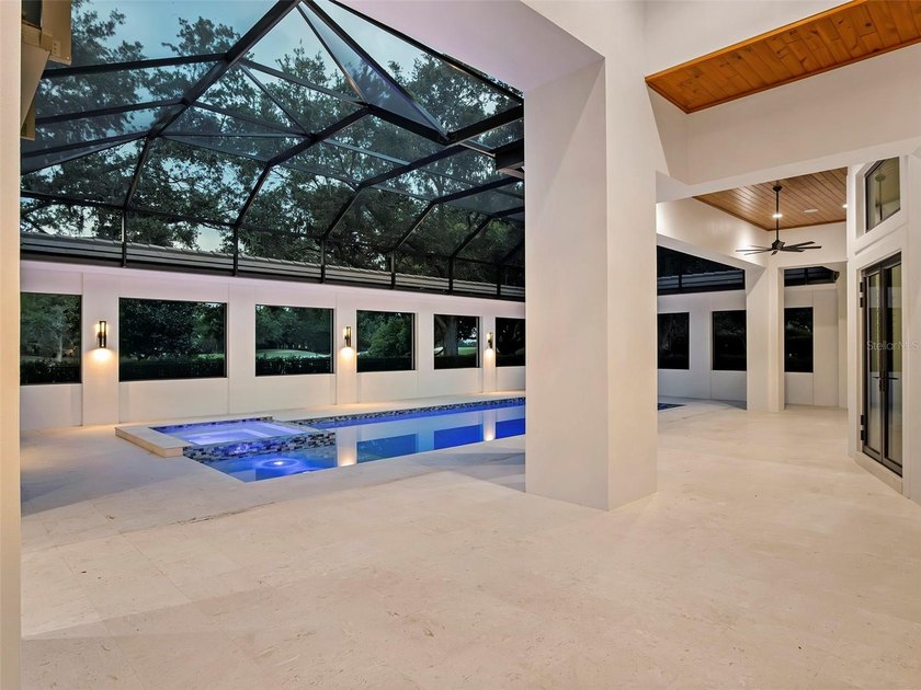 Set within the gates of renowned Isleworth, this beautifully - photo 50