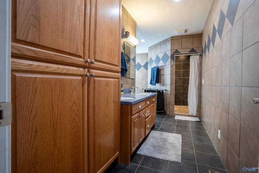 Discover this beautifully remodeled 5,080 sq. ft. home featuring - photo 17