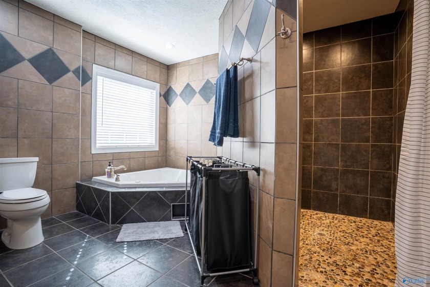 Discover this beautifully remodeled 5,080 sq. ft. home featuring - photo 18