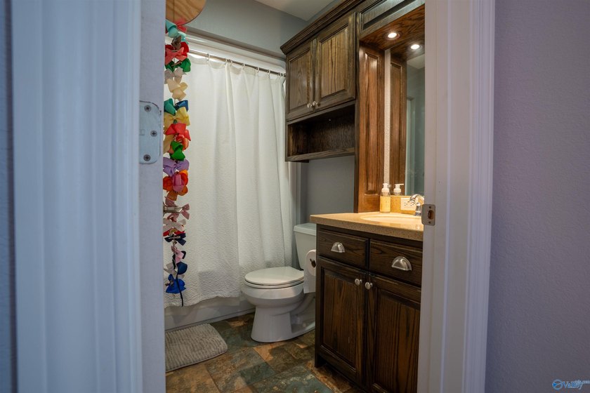 Discover this beautifully remodeled 5,080 sq. ft. home featuring - photo 29