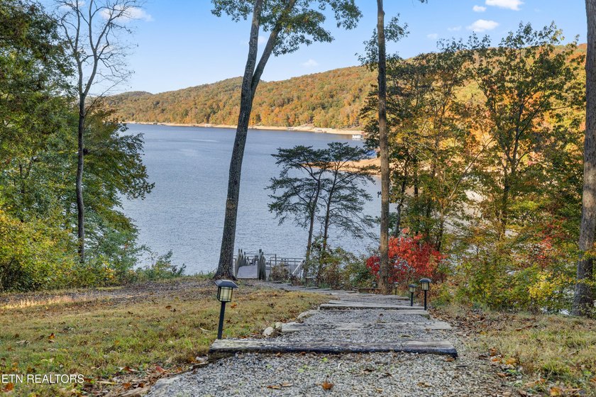 WELCOME TO YOUR BEAUTIFULLY MAINTAINED LAKEFRONT HOME. This - photo 49