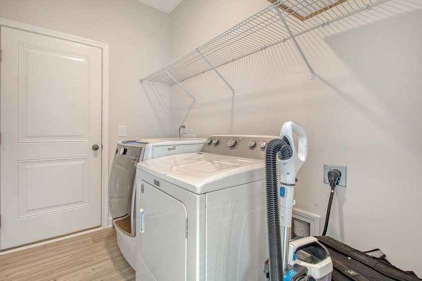 Proudly presenting this exceptional 4-bedroom, 2.5-bathroom home - photo 16