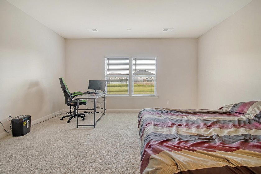 Proudly presenting this exceptional 4-bedroom, 2.5-bathroom home - photo 20