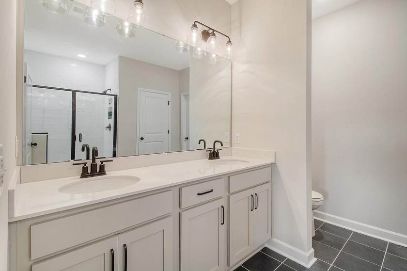 Proudly presenting this exceptional 4-bedroom, 2.5-bathroom home - photo 21