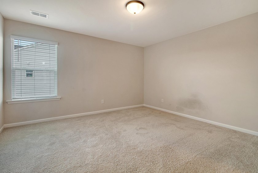 Proudly presenting this exceptional 4-bedroom, 2.5-bathroom home - photo 27