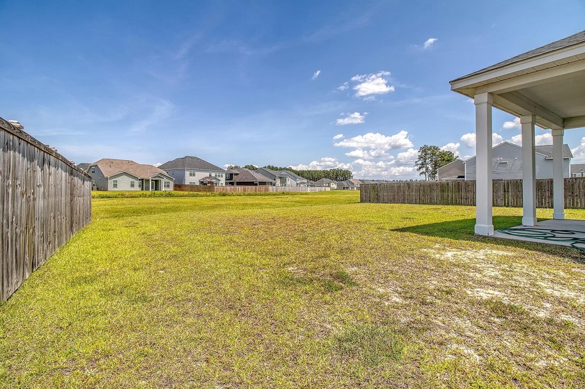 Proudly presenting this exceptional 4-bedroom, 2.5-bathroom home - photo 36