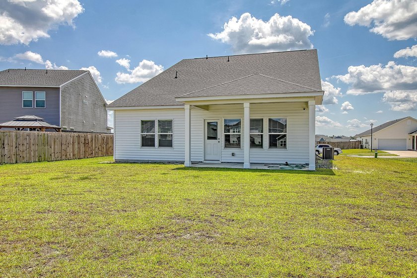 Proudly presenting this exceptional 4-bedroom, 2.5-bathroom home - photo 37
