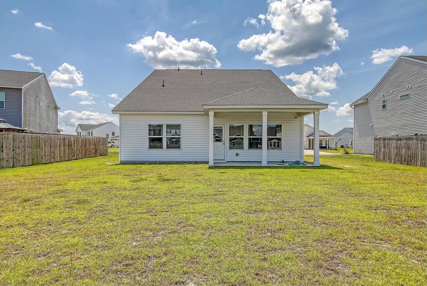 Proudly presenting this exceptional 4-bedroom, 2.5-bathroom home - photo 38