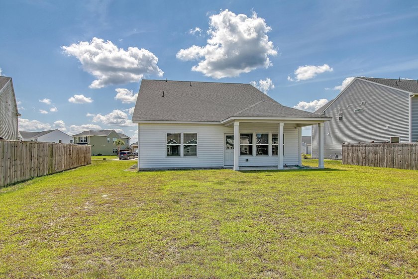 Proudly presenting this exceptional 4-bedroom, 2.5-bathroom home - photo 39