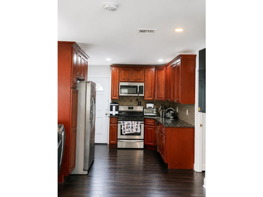 This ranch-style property renovated 2025,offers both comfort and - photo 4