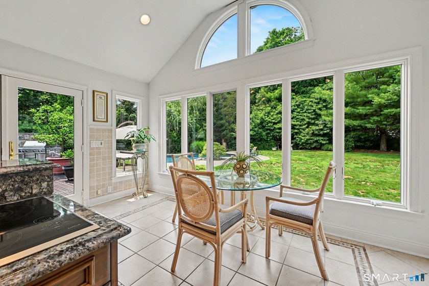 Tucked away on a quiet, tree-lined street in North Stamford - photo 13