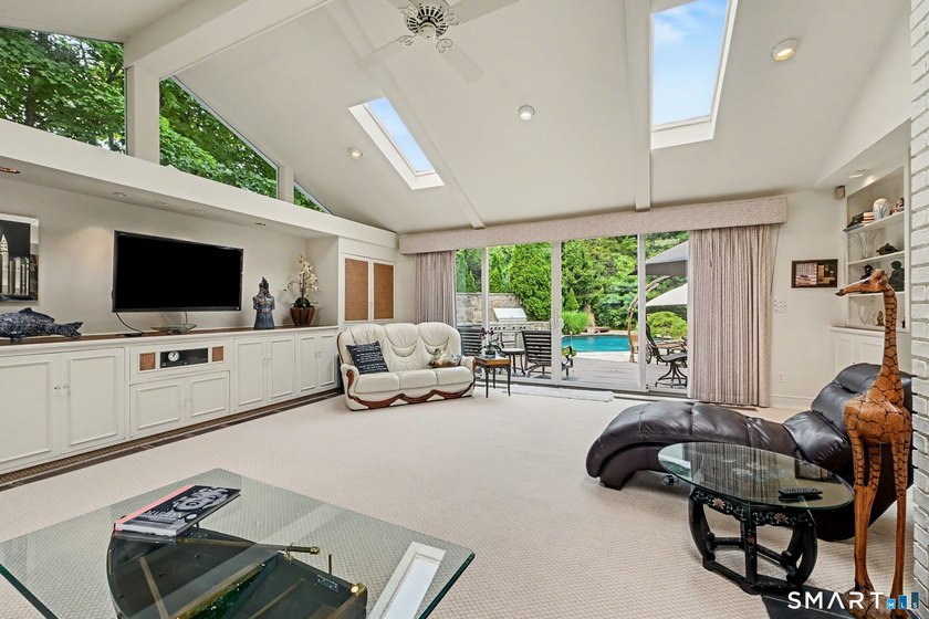 Tucked away on a quiet, tree-lined street in North Stamford - photo 15
