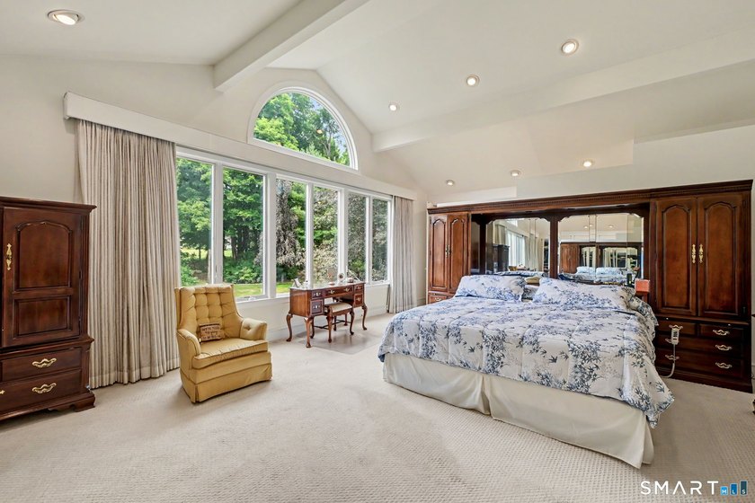 Tucked away on a quiet, tree-lined street in North Stamford - photo 17
