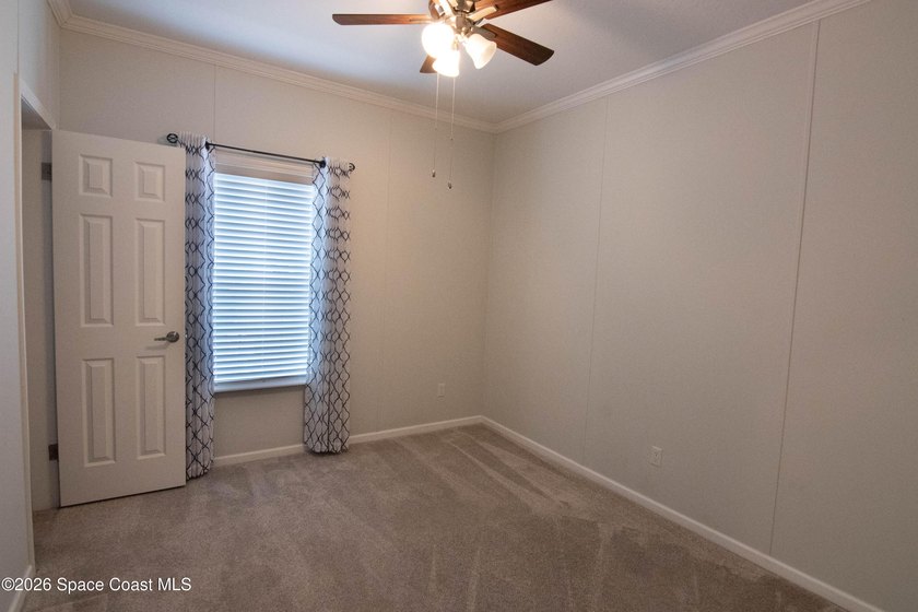 Welcome home to this charming 3-bedroom, 2-bath residence in the - photo 17