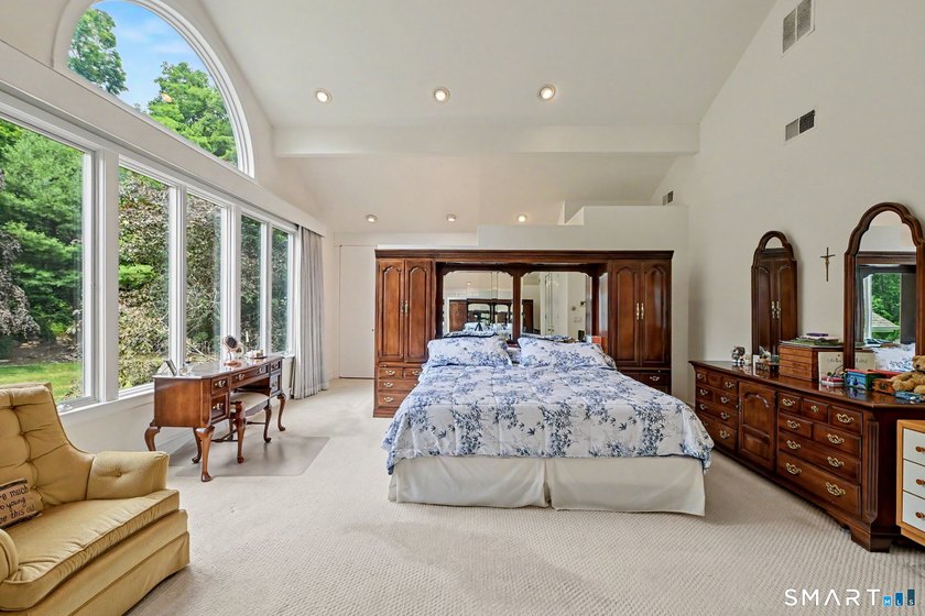 Tucked away on a quiet, tree-lined street in North Stamford - photo 18