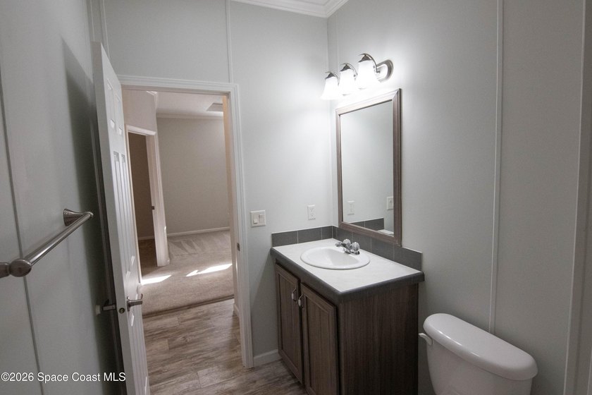 Welcome home to this charming 3-bedroom, 2-bath residence in the - photo 22