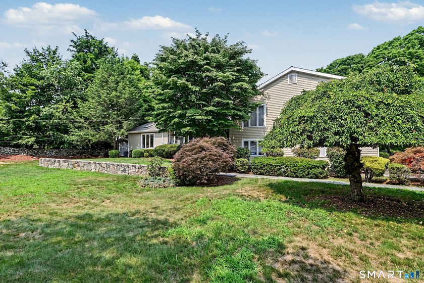 Tucked away on a quiet, tree-lined street in North Stamford - photo 27