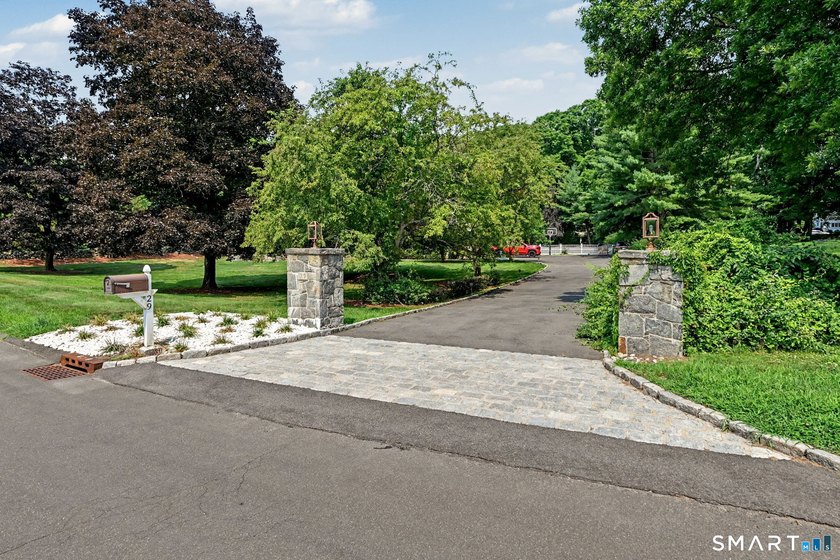 Tucked away on a quiet, tree-lined street in North Stamford - photo 28