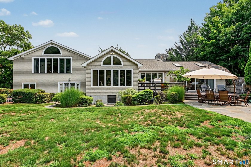 Tucked away on a quiet, tree-lined street in North Stamford - photo 29