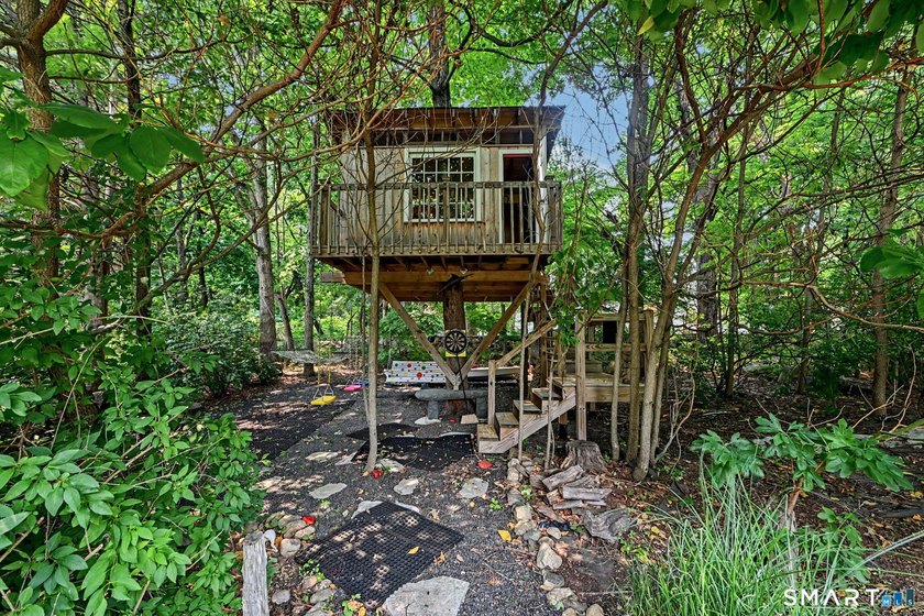 Tucked away on a quiet, tree-lined street in North Stamford - photo 35
