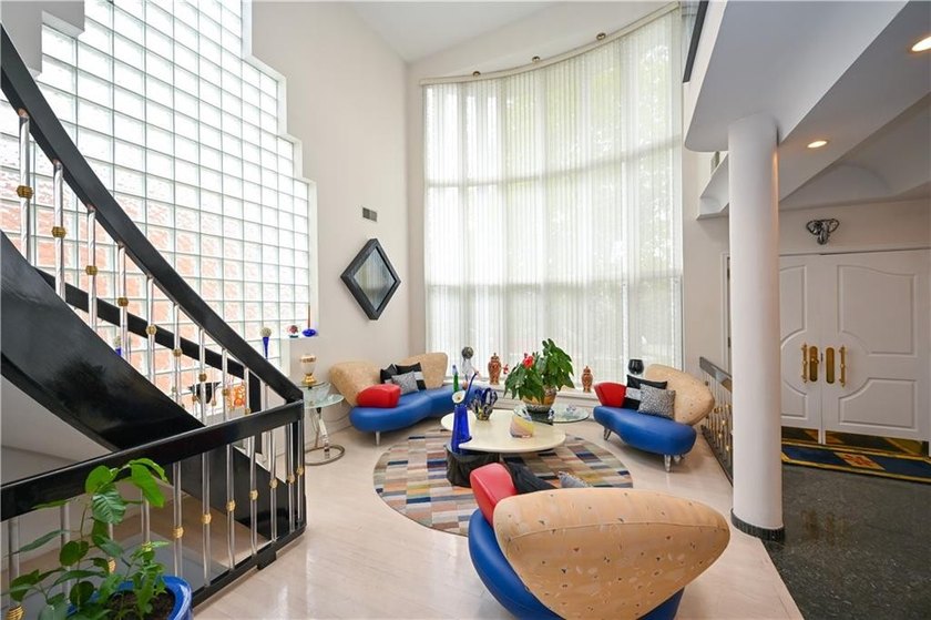 Enter into an elegant Center Hall Colonial with grand foyer that - photo 4