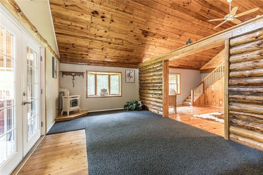 Tucked away on a peaceful private road, this heavenly log home - photo 28