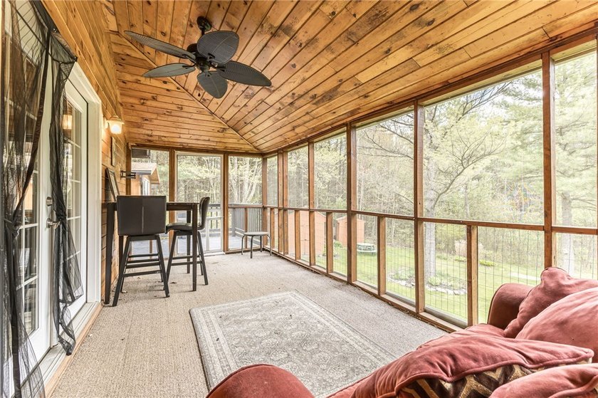 Tucked away on a peaceful private road, this heavenly log home - photo 29