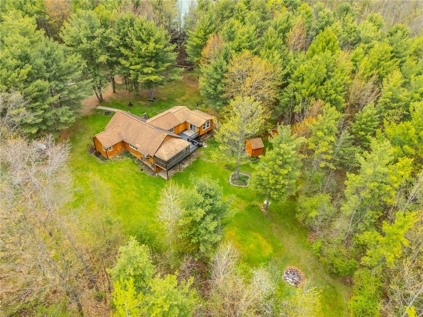 Tucked away on a peaceful private road, this heavenly log home - photo 45