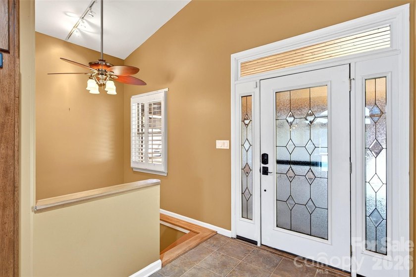 Tucked into the coveted Marion Lake Club community, this - photo 4