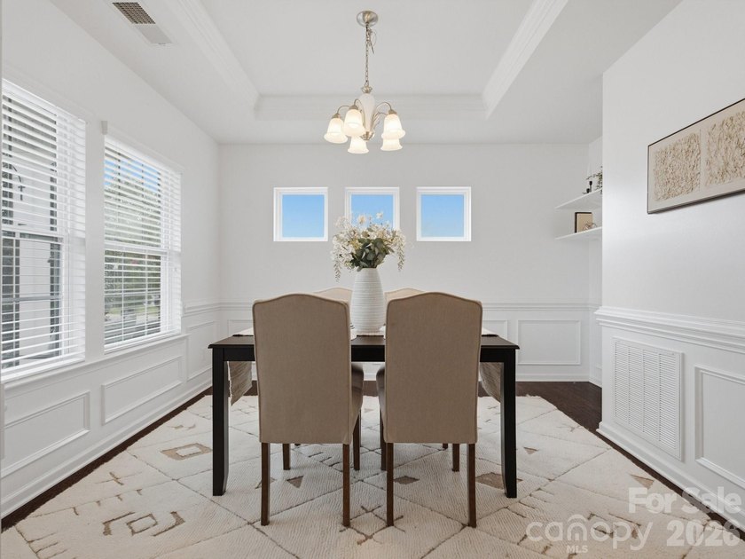 Welcome home to this beautifully appointed home in the highly - photo 5