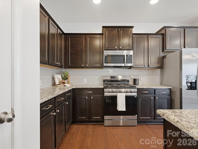 Welcome home to this beautifully appointed home in the highly - photo 6