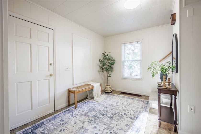Welcome to 77 Boxart Street! A turnkey 4-bedroom/1.5-bath - photo 3