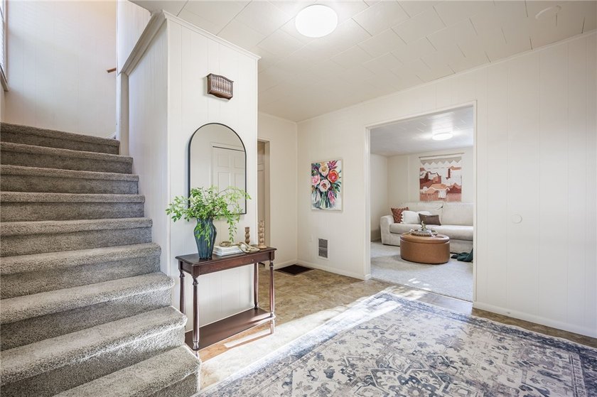 Welcome to 77 Boxart Street! A turnkey 4-bedroom/1.5-bath - photo 4