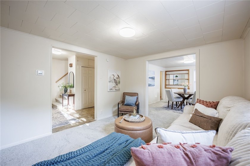 Welcome to 77 Boxart Street! A turnkey 4-bedroom/1.5-bath - photo 7