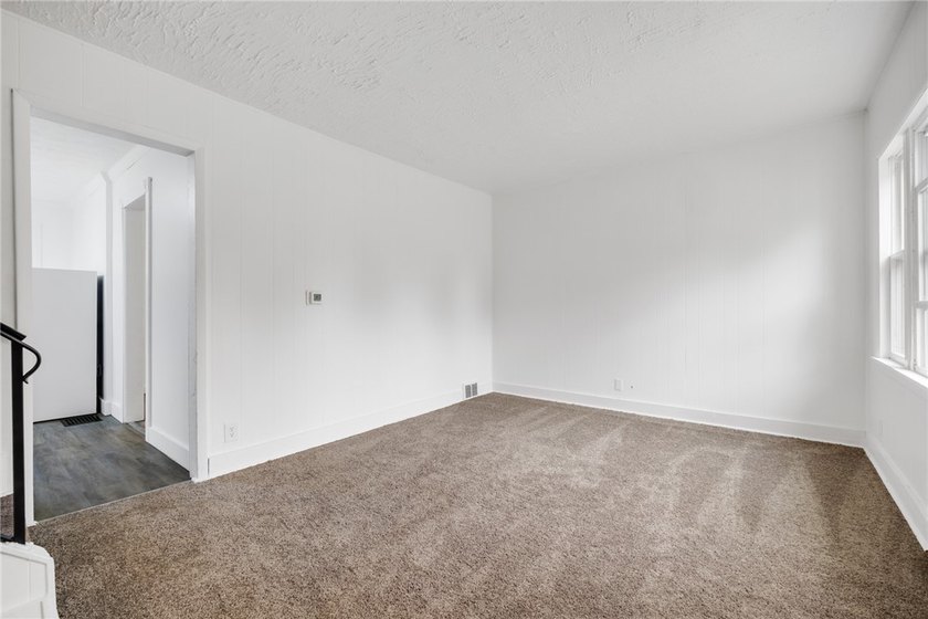 Welcome to this charming 3-bedroom, 1-bath home in Rochester's - photo 6