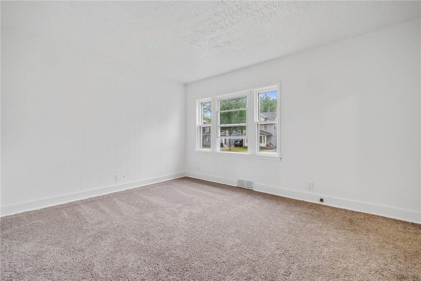 Welcome to this charming 3-bedroom, 1-bath home in Rochester's - photo 7