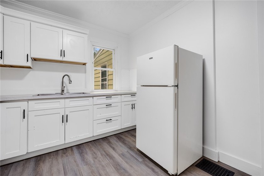 Welcome to this charming 3-bedroom, 1-bath home in Rochester's - photo 9