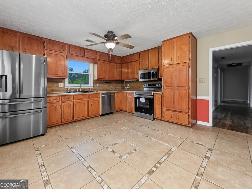 Nestled on 5 private acres with no HOA, this beautifully - photo 11