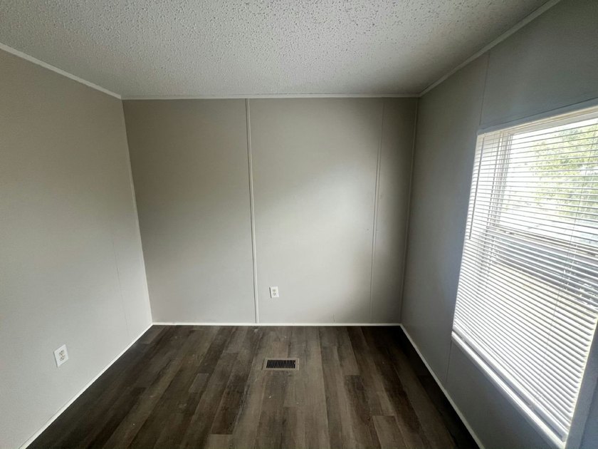 Right now, you could own a 2005 model 3 bed/2 bath, 1056 sq. ft - photo 13