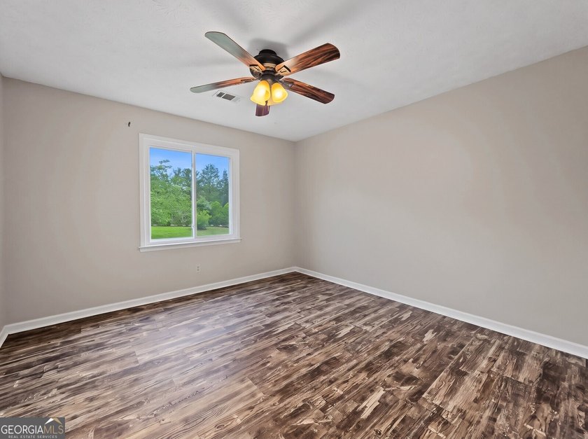 Nestled on 5 private acres with no HOA, this beautifully - photo 14