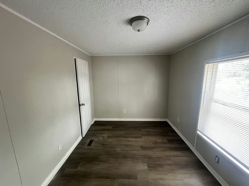 Right now, you could own a 2005 model 3 bed/2 bath, 1056 sq. ft - photo 14