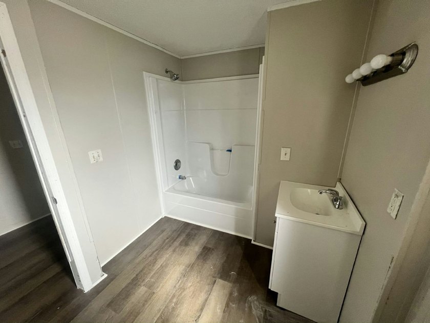 Right now, you could own a 2005 model 3 bed/2 bath, 1056 sq. ft - photo 16