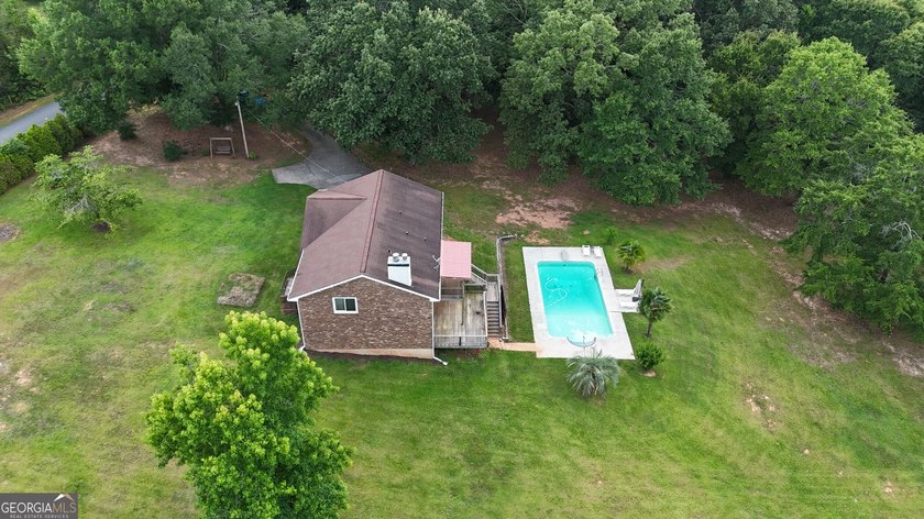 Nestled on 5 private acres with no HOA, this beautifully - photo 29