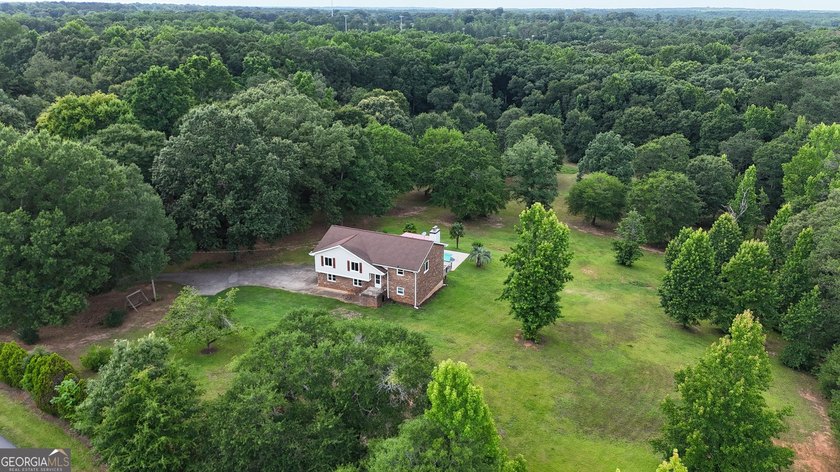 Nestled on 5 private acres with no HOA, this beautifully - photo 30