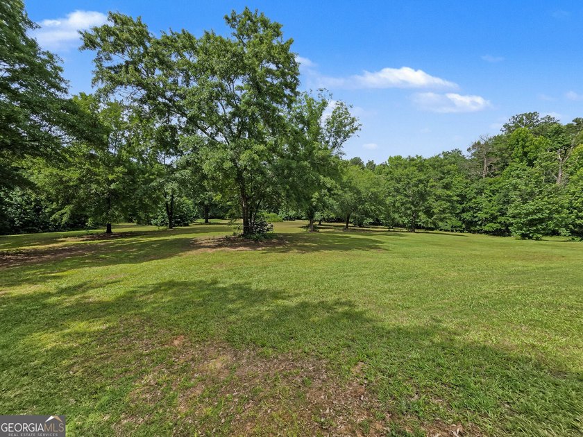 Nestled on 5 private acres with no HOA, this beautifully - photo 32