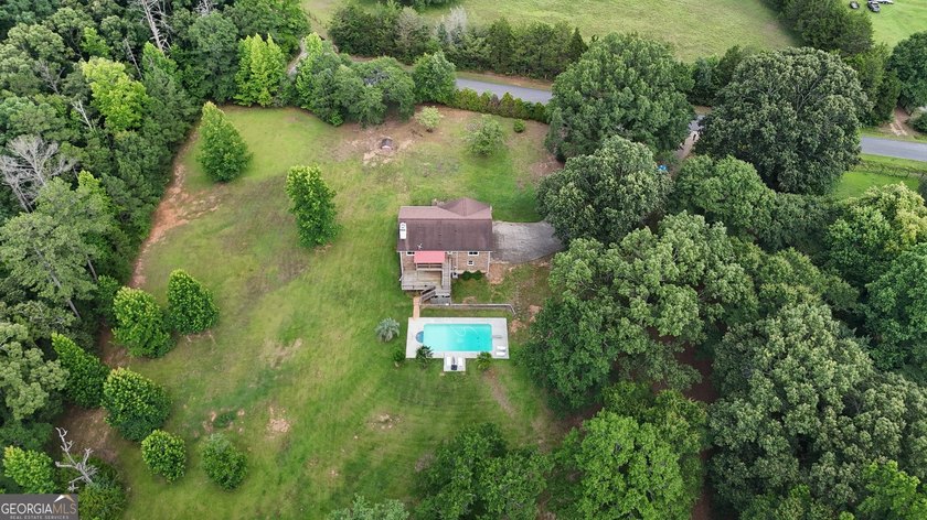 Nestled on 5 private acres with no HOA, this beautifully - photo 34
